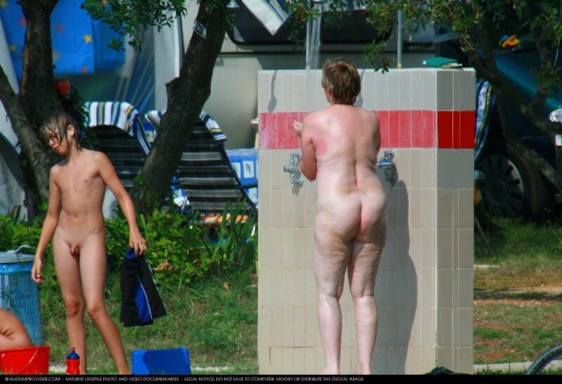 Covered in Towel Nudists-Boardwalk Biking - nudism blog