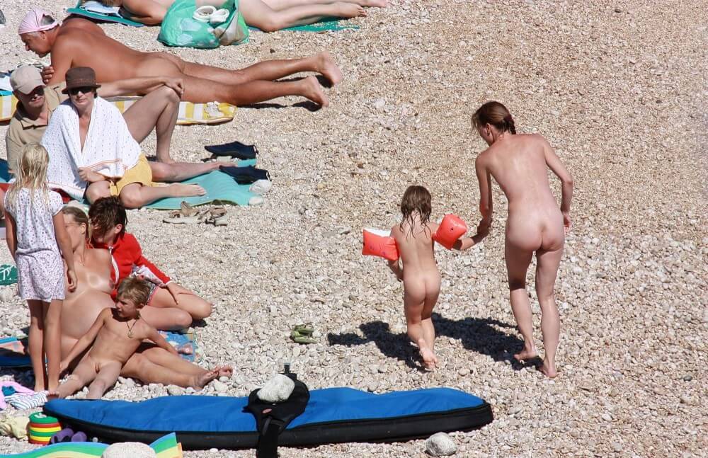 Orange Floaty Safety First Naturist pics - nudism blog
